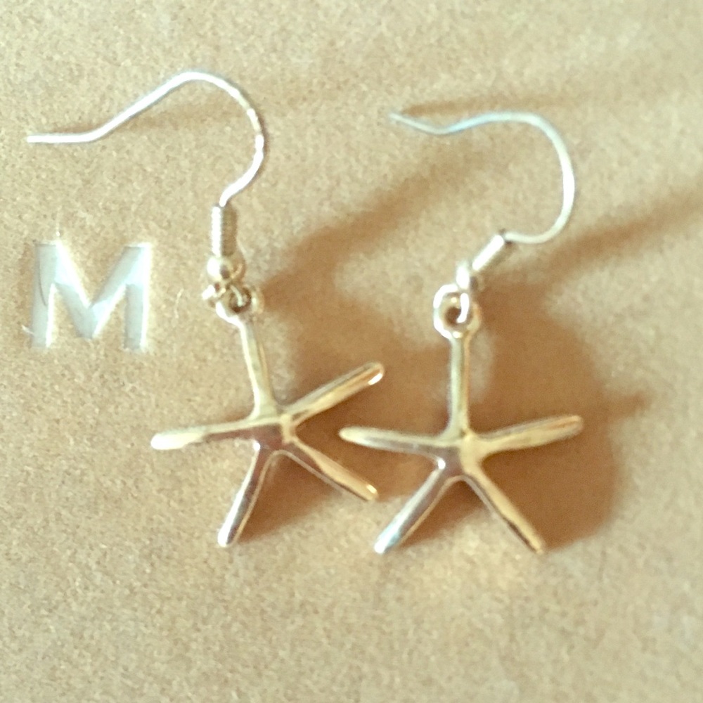 Gold starfish dangly earrings